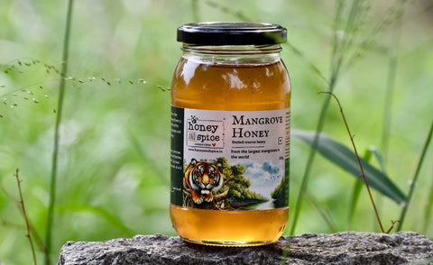 mangrove honey which is stored in an airtight glass jar from honey and spice