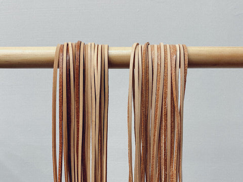 Leather strips prepped for weaving