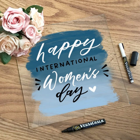 Happy International Women's Day chalk art sign