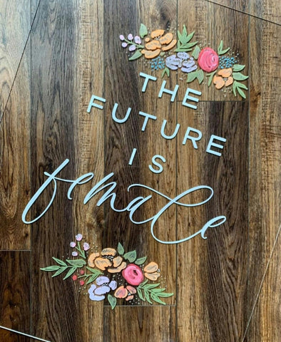 "The future is female" chalk art sign