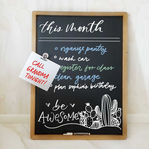 Goal setting for New Year with chalk marker and chalkboard
