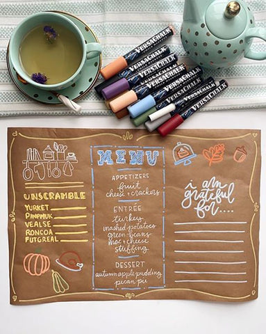 Table setting for holiday feasts with chalk markers