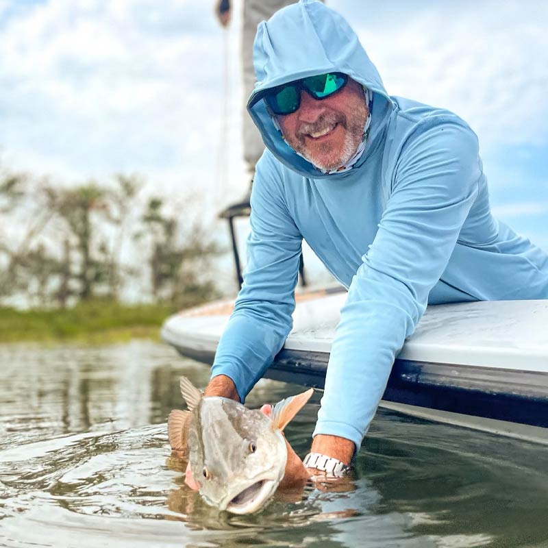 Releasing a nice redfish this week with Captain Tuck Scott