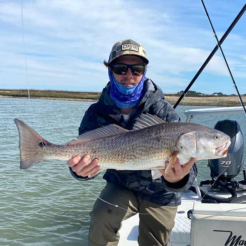 Captain Addison Rupert with a nice fish caught on the fly