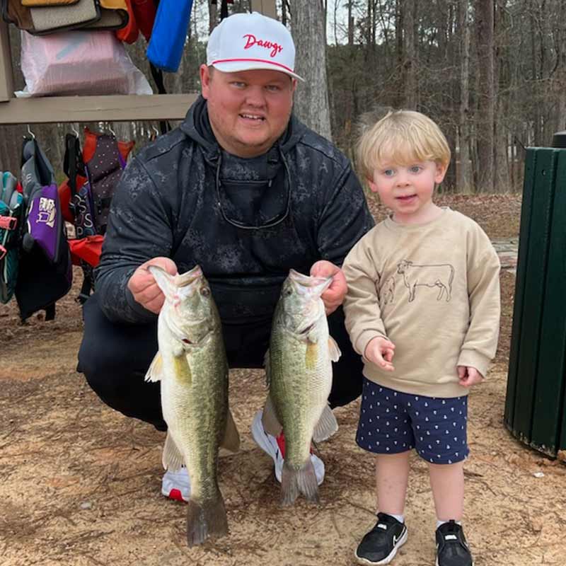 Tyler Matthews, son and a couple of healthy buck bass