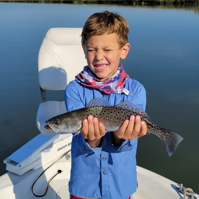 A young angler caught this trout with Captain Ron Davis, Jr. 