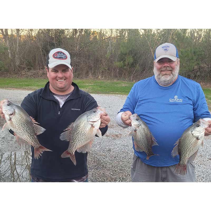 Roland Addy (left) and some slabs caught this week