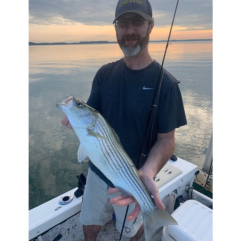 A long fish caught early with Guide Chip Hamilton