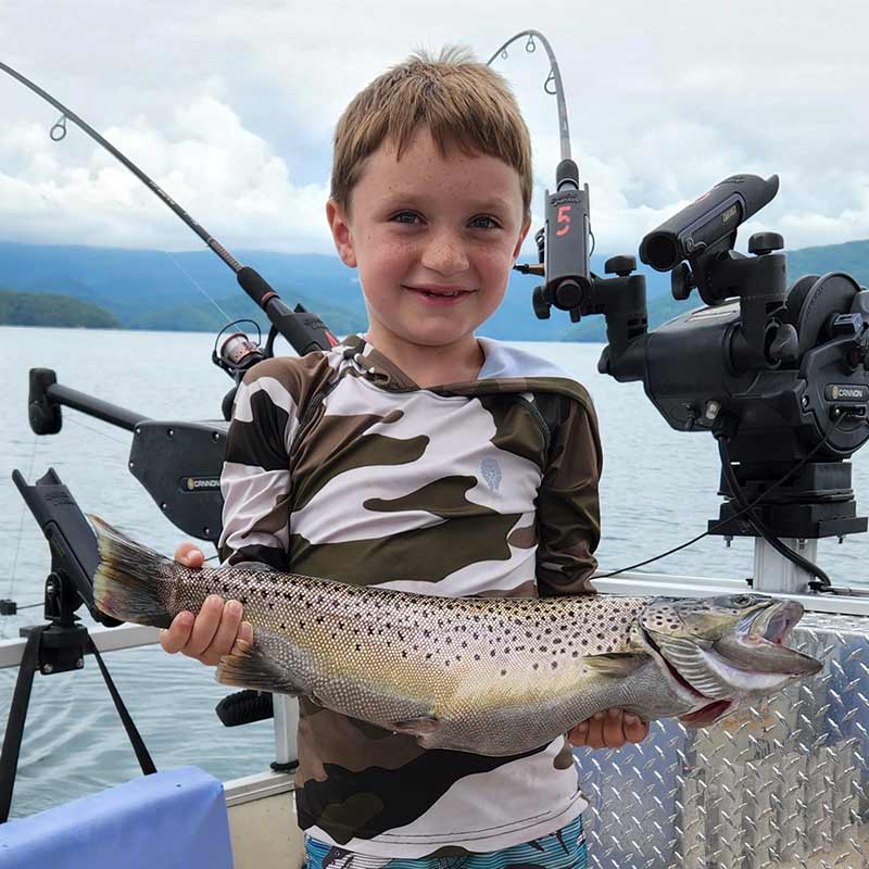 Spoiled for life! - a young angler with his first-ever fish, caught with Sam Jones