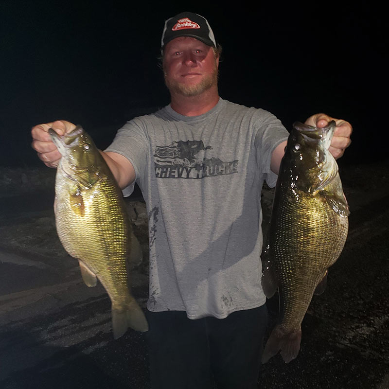 Joe Anders with a couple of monster spotted bass caught last week