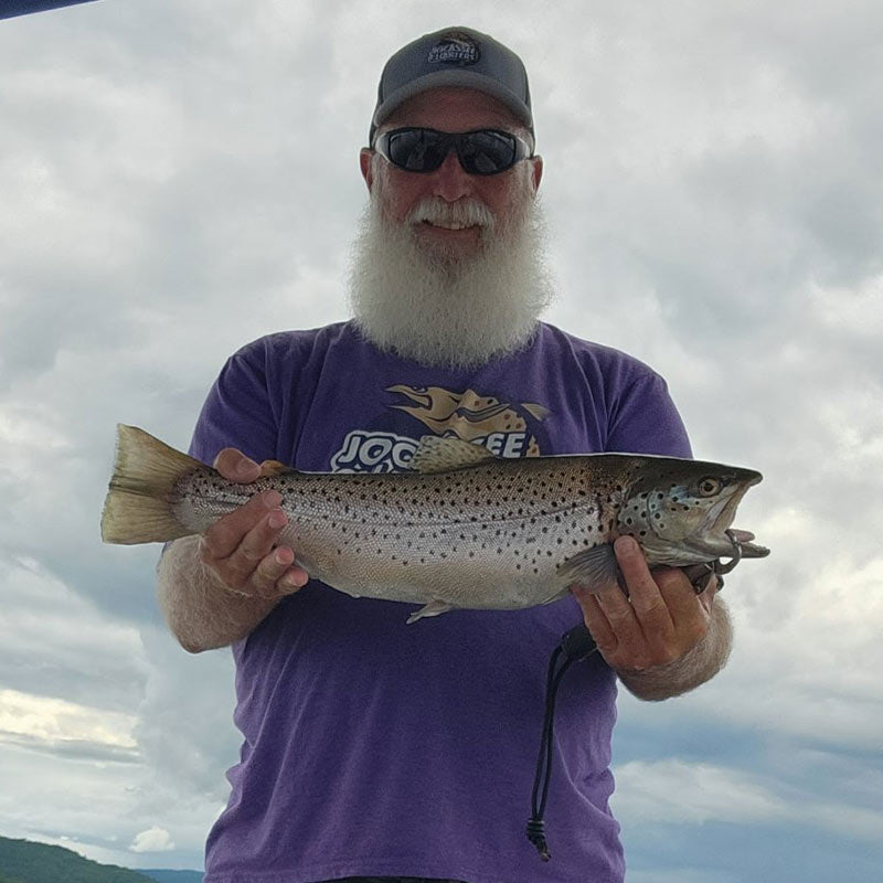 Guide Sam Jones with a "citation" trout over 20 inches caught and released this week