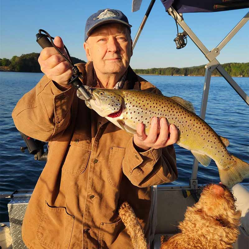 A beautiful male brown caught this week with Jocassee Charters