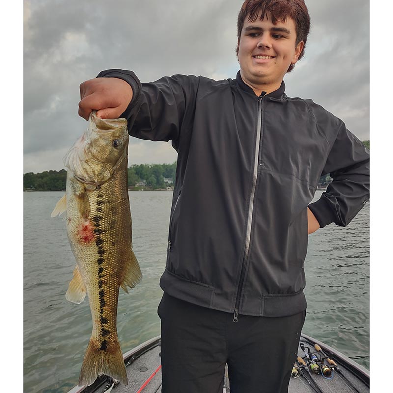 Another fish still showing signs of the recent spawn caught on a topwater this week with Guide Charles Townson