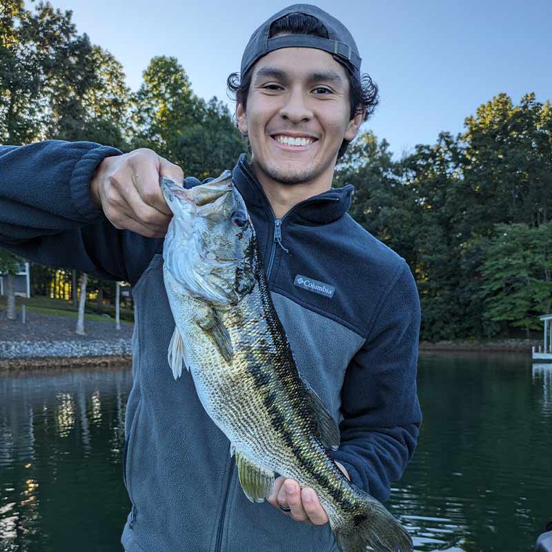 A big spotted bass caught on a topwater lure this week with Guide Charles Townson