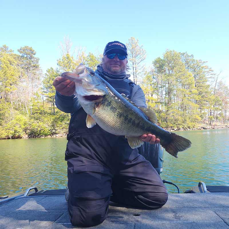 Joe Anders with a monster