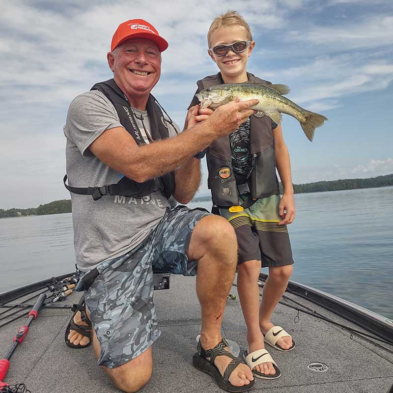 Charles Townson and a happy young angler