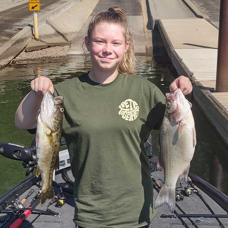 A white bass and a spot caught on a jigging spoon with Guide Charles Townson