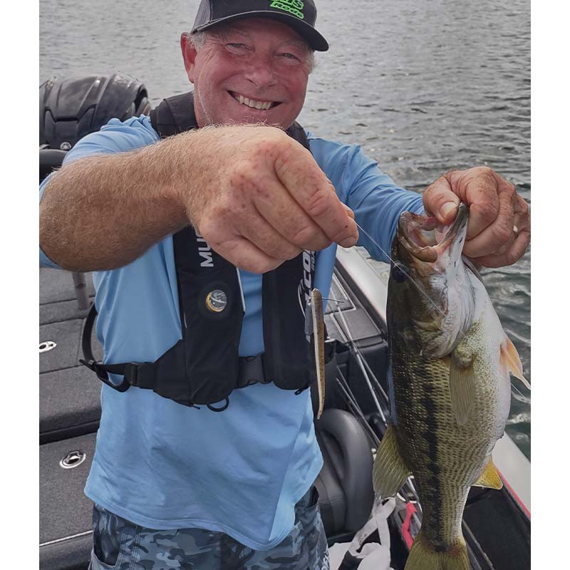Guide Charles Townson with a fat spot caught in 70 feet on a free rig