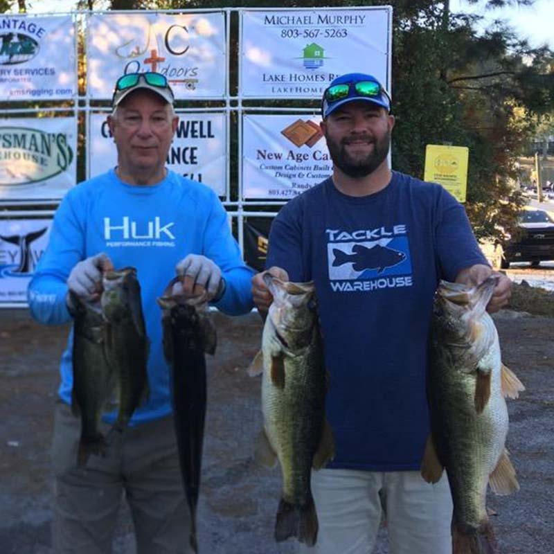 Steve and Andy Wicker with the winning bag