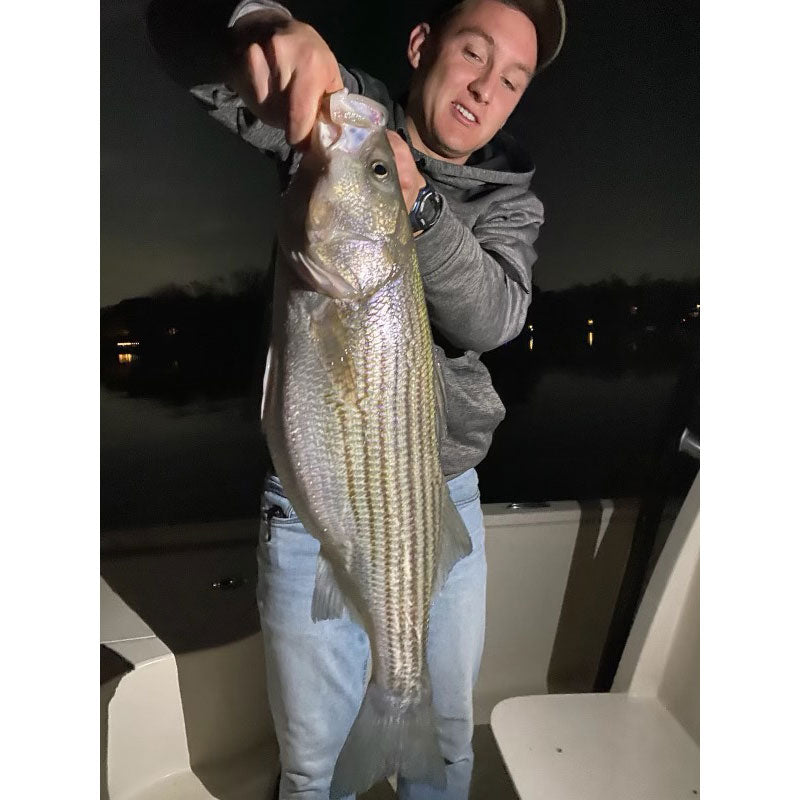 Ethan Dawsey with a fat 26-inch fish caught at night on a green light
