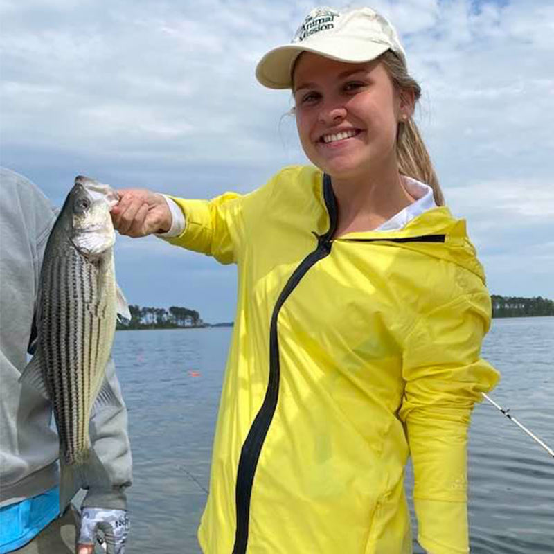 A happy angler caught this striped bass with Captain Brad Taylor