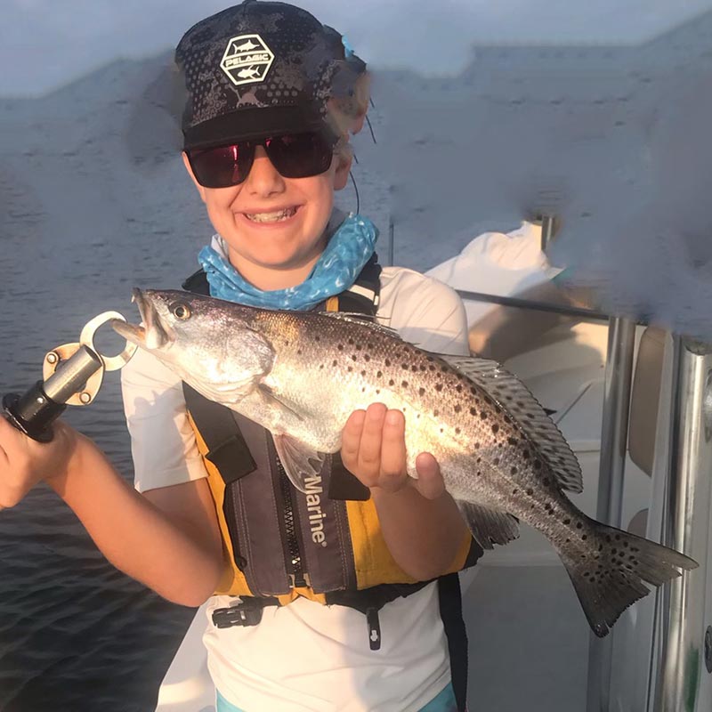 Another happy camper with Captain Smiley Fishing Charters