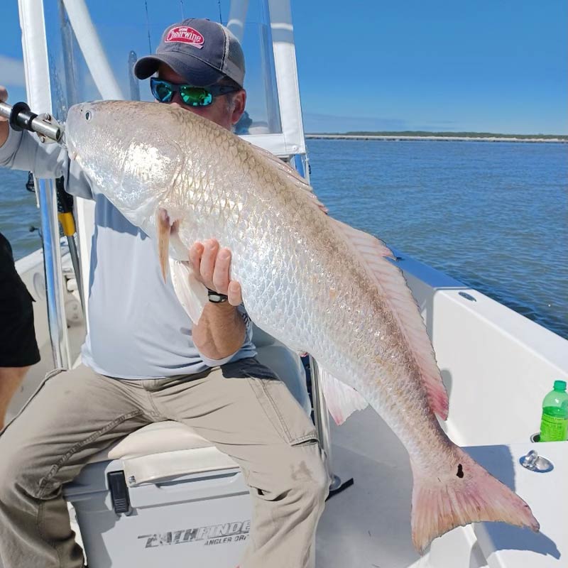 A big bull red caught with Captain Smiley Fishing Charters