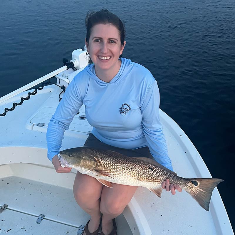 Mrs. Captain Buddy Love with a nice redfish yesterday