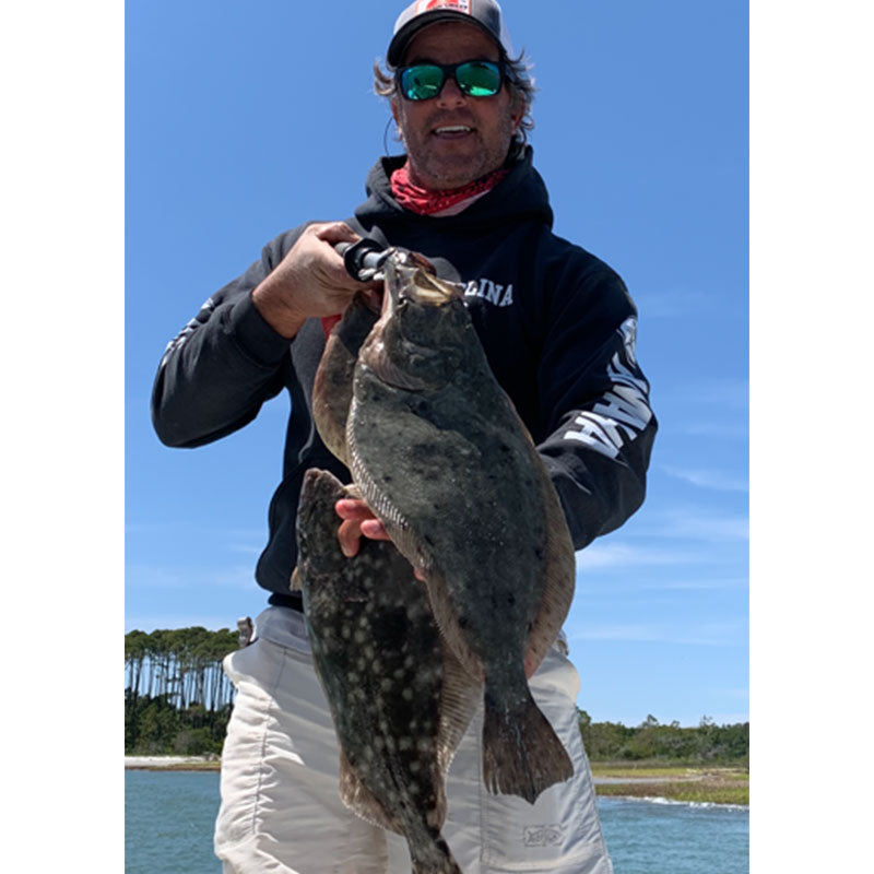 Captain Smiley with some nice flounder caught yesterday