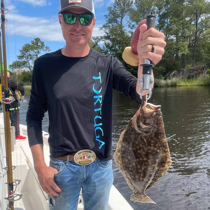 A good flounder caught this week with Captain Smiley