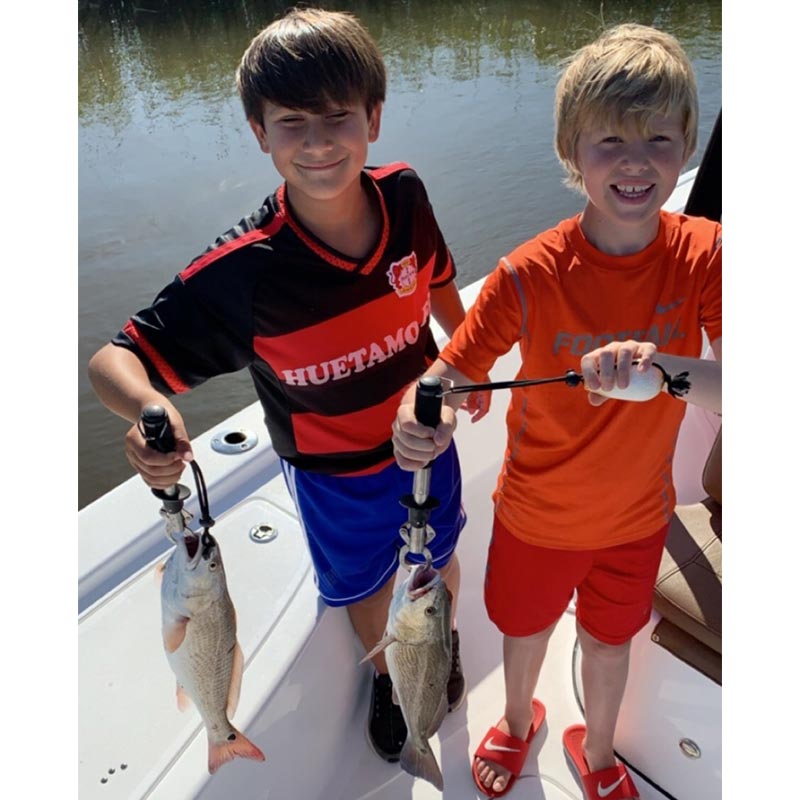 Happy young anglers on Captain Smiley's boat this week