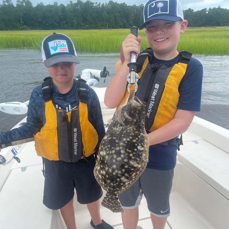 A nice flounder caught this week at Kids' Camp with Captain Smiley Fishing Charters