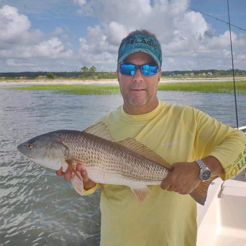 A typical red caught this week with Captain Smiley Fishing Charters