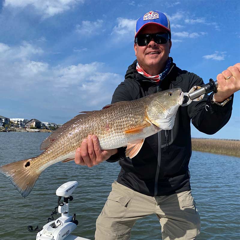 A good redfish caught this week with Captain Smiley