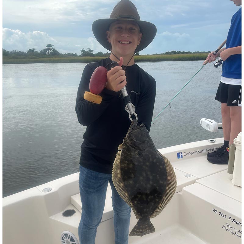 A big old flounder caught yesterday with Captain Smiley Fishing Charters