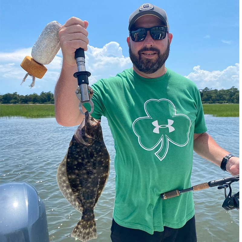 A "lucky" flounder caught this week with Captain Smiley Fishing Charters