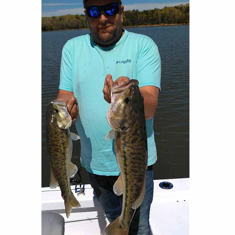 Jerry Kotal's brother with a couple of fish they caught together last week on Russell