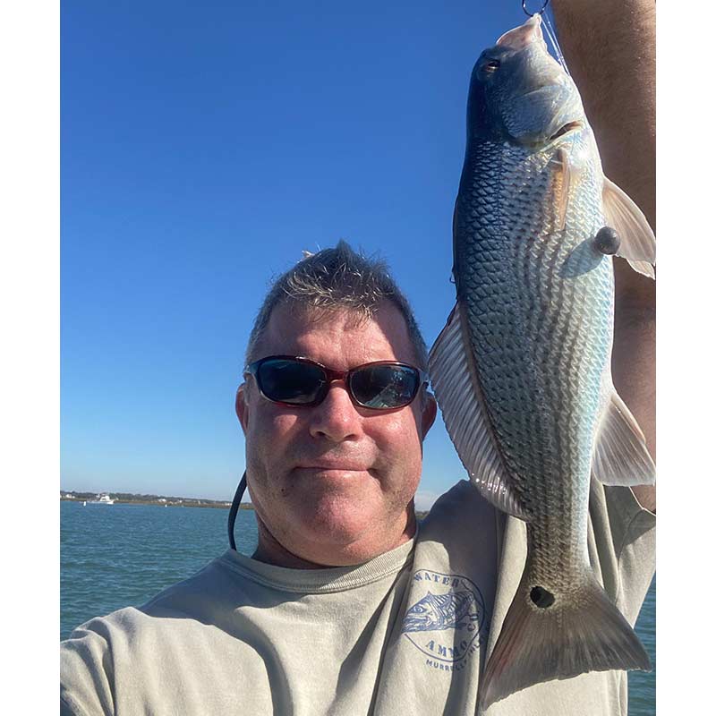 Captain Tom Cushman on the water yesterday