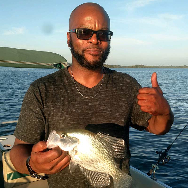 Amos from Rochester, NY with a nice Santee crappie caught with Captain Steve English