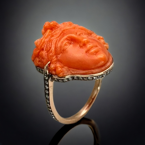 Antique Bacchus carving in a modern ring setting