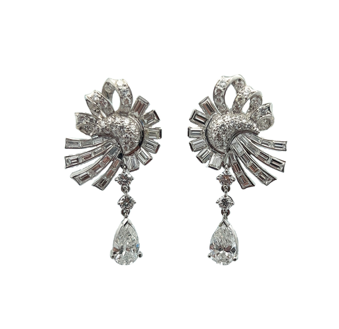 Diamond and platinum earrings, circa 1950.