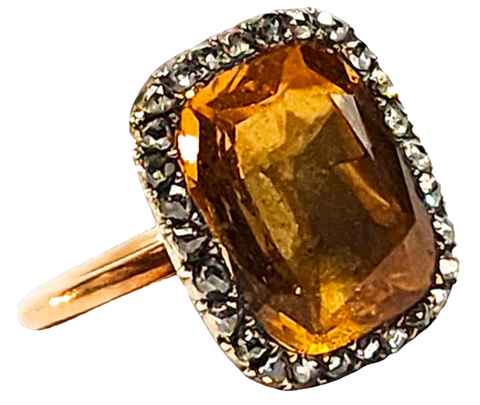 Georgian ring features imperial topaz with foil back center stone, closed setting, rose cut diamonds and rose gold.