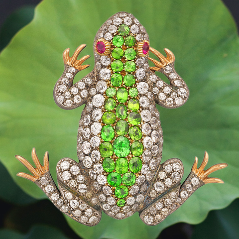 Victorian frog brooch/pendant highlights  a central stripe of demantoid garnet with diamonds and ruby set in silver on gold, circa 1890.