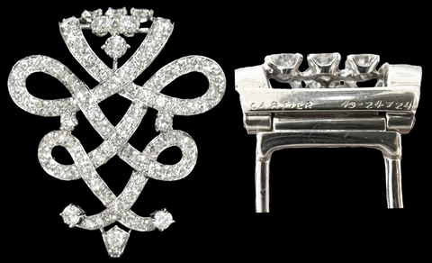 Diamond and platinum brooch/pendant, signed Cartier, circa 1950s.