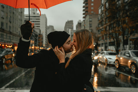 Couple kissing in rain. Clay Banks, courtesy Unsplash