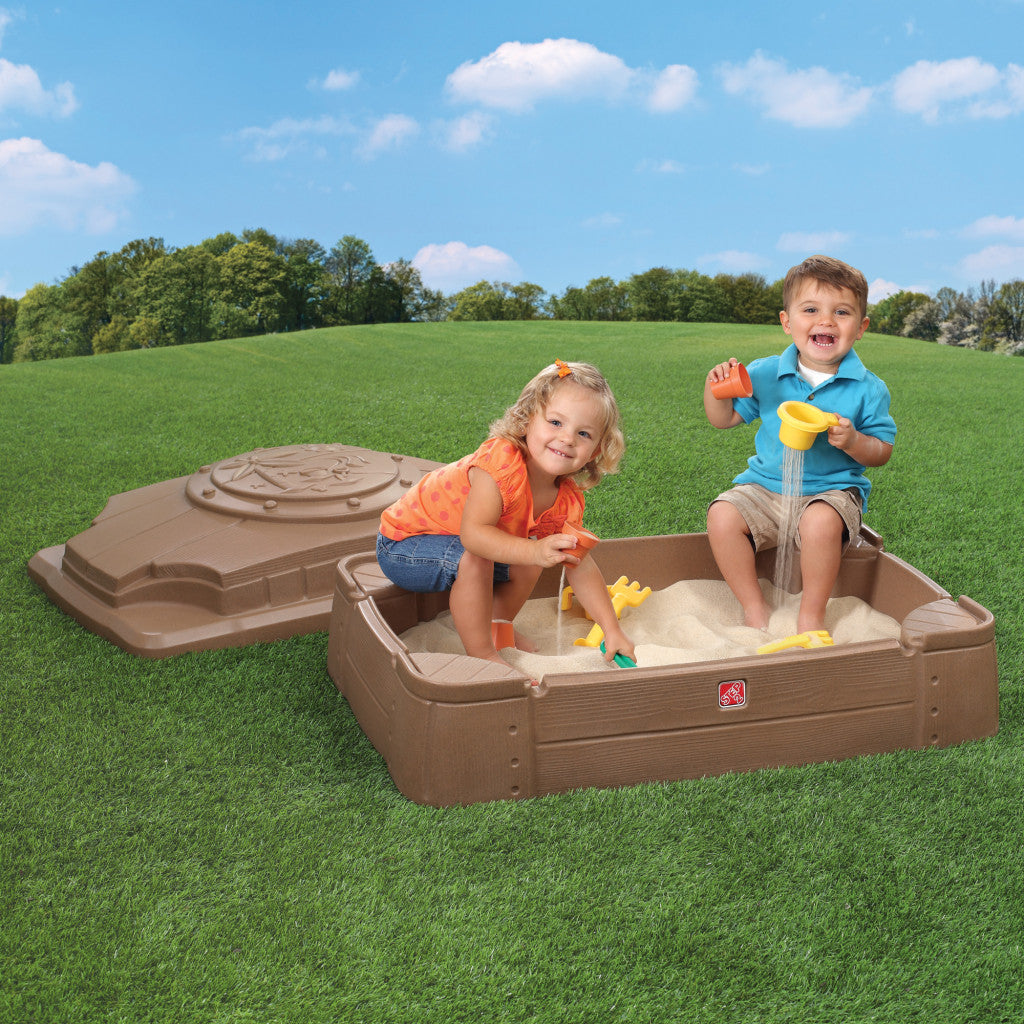 kids playing in a sandbox