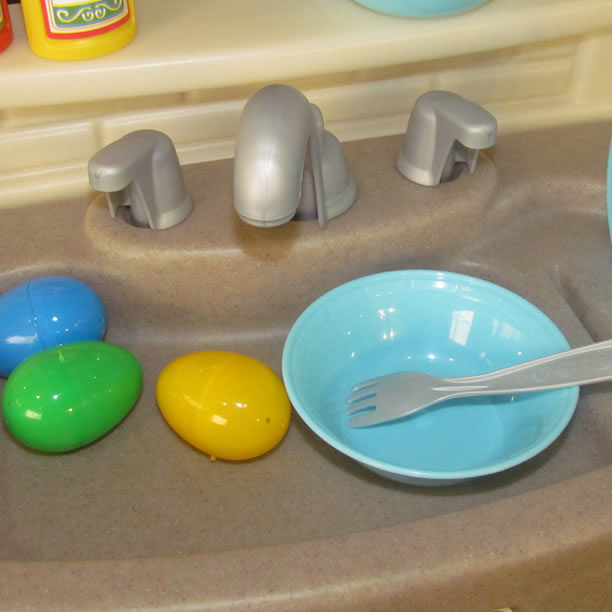 Easter-eggs-in-play-kitchen-sink