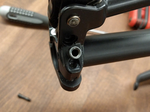 Closeup view of hardware on brake lever