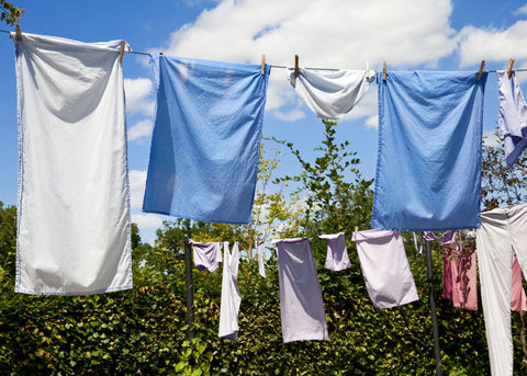 pictures of clothes drying outside on a clothesline