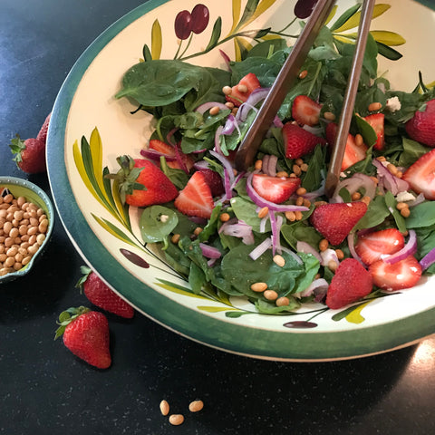 strawberry salad in olive bowl